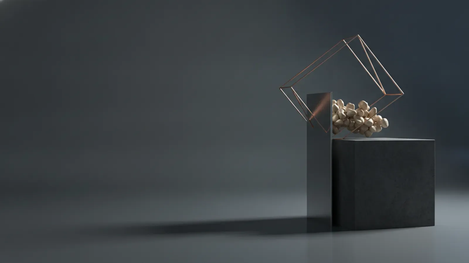 A dark plinth supporting an angled copper wireframe prism filled with pale stones, partially obscured by a standing sheet.