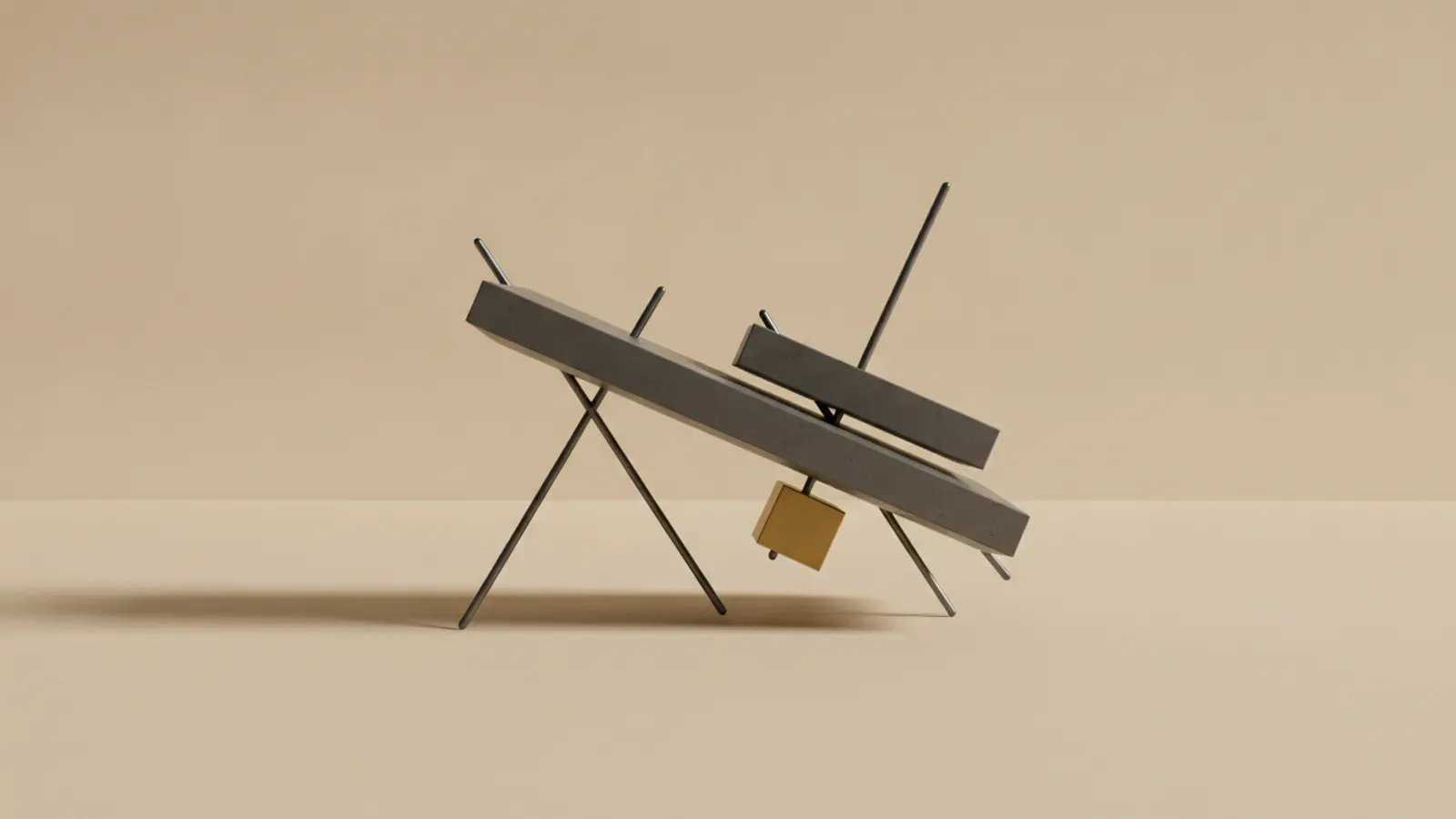 An inclined dark grey beam balanced on slender steel pins, with a small golden cube suspended beneath as a counterweight.